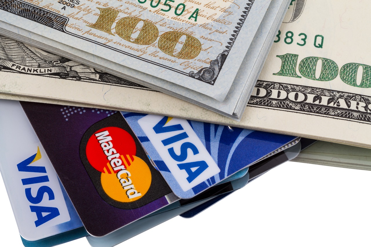 Credit cards and hundred dollar bills