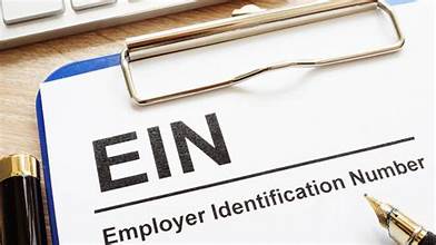 A clipboard with the words EIN, Employer Identification Number